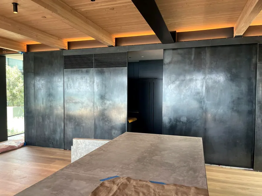 Large bespoke dark metal architectural wall panels